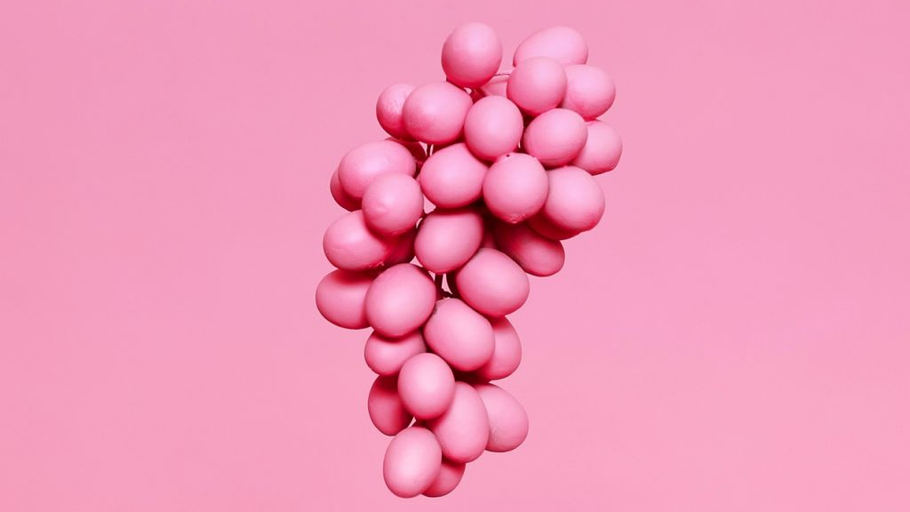 Raisin rose sur fond rose