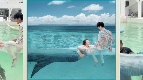 Une femme déguisée en sirène dans une piscine