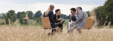 Business people having meeting outdoors